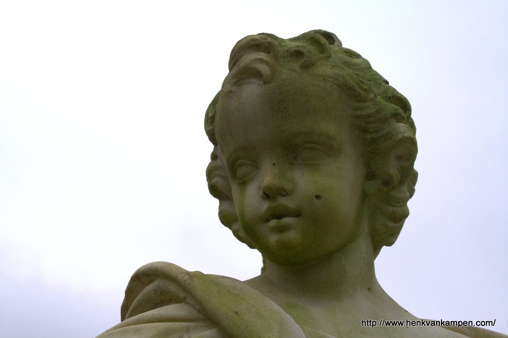 Head of a putto in the gardens of Soestdijk Royal Palace