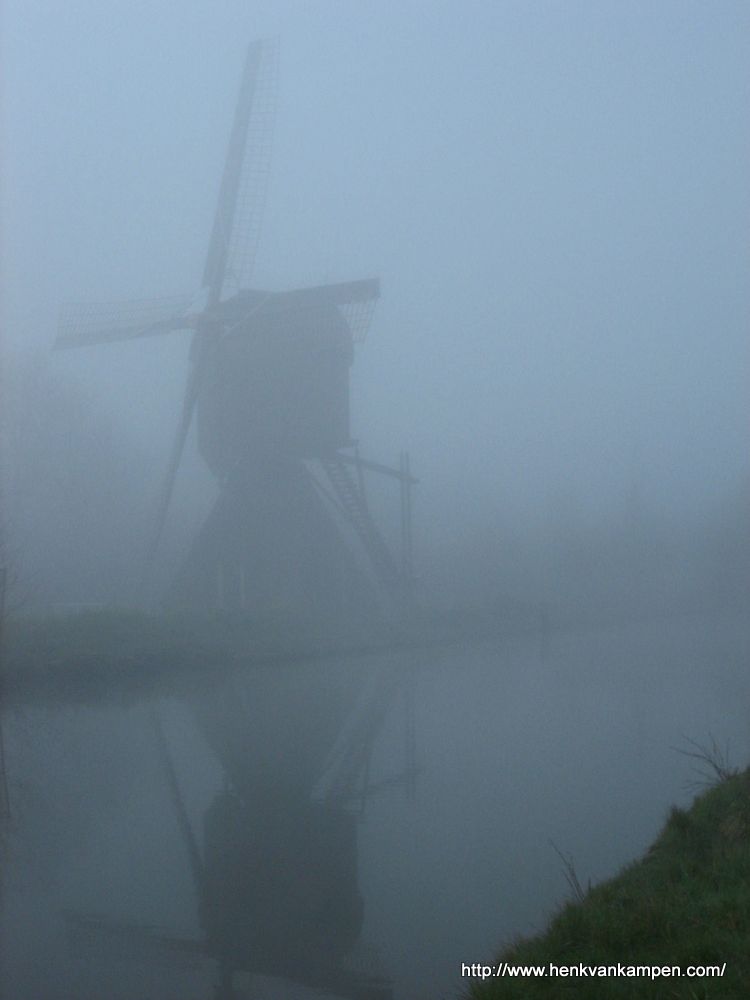 A Dutch windmill in the fog