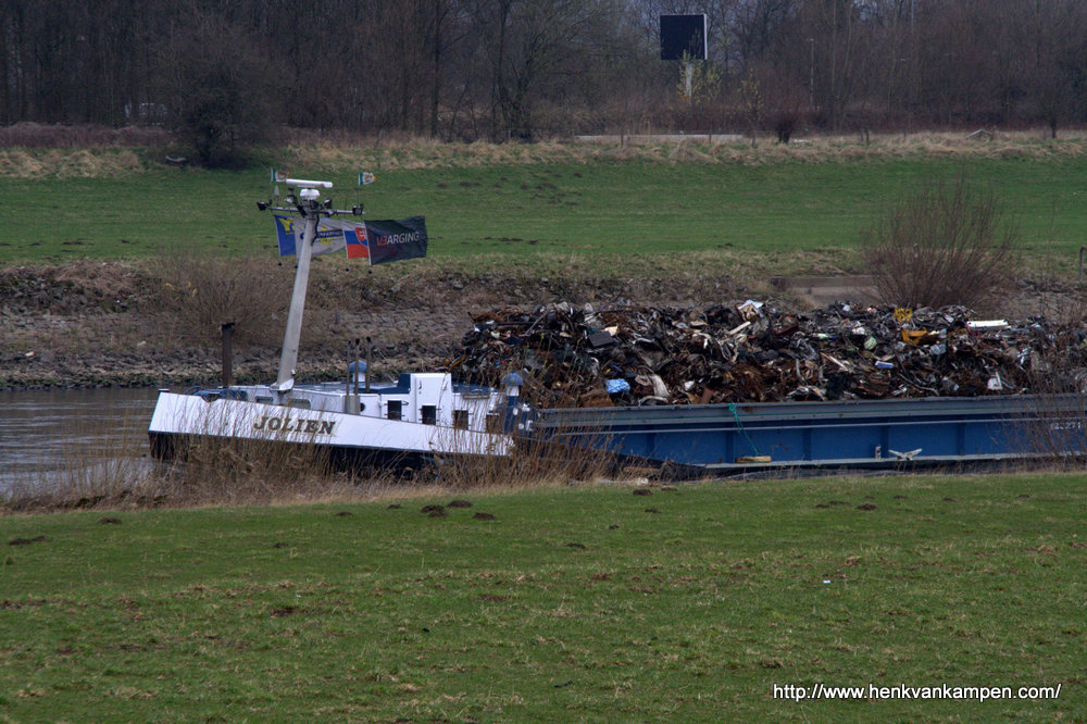 Ship with scrap cargo on the IJssel river